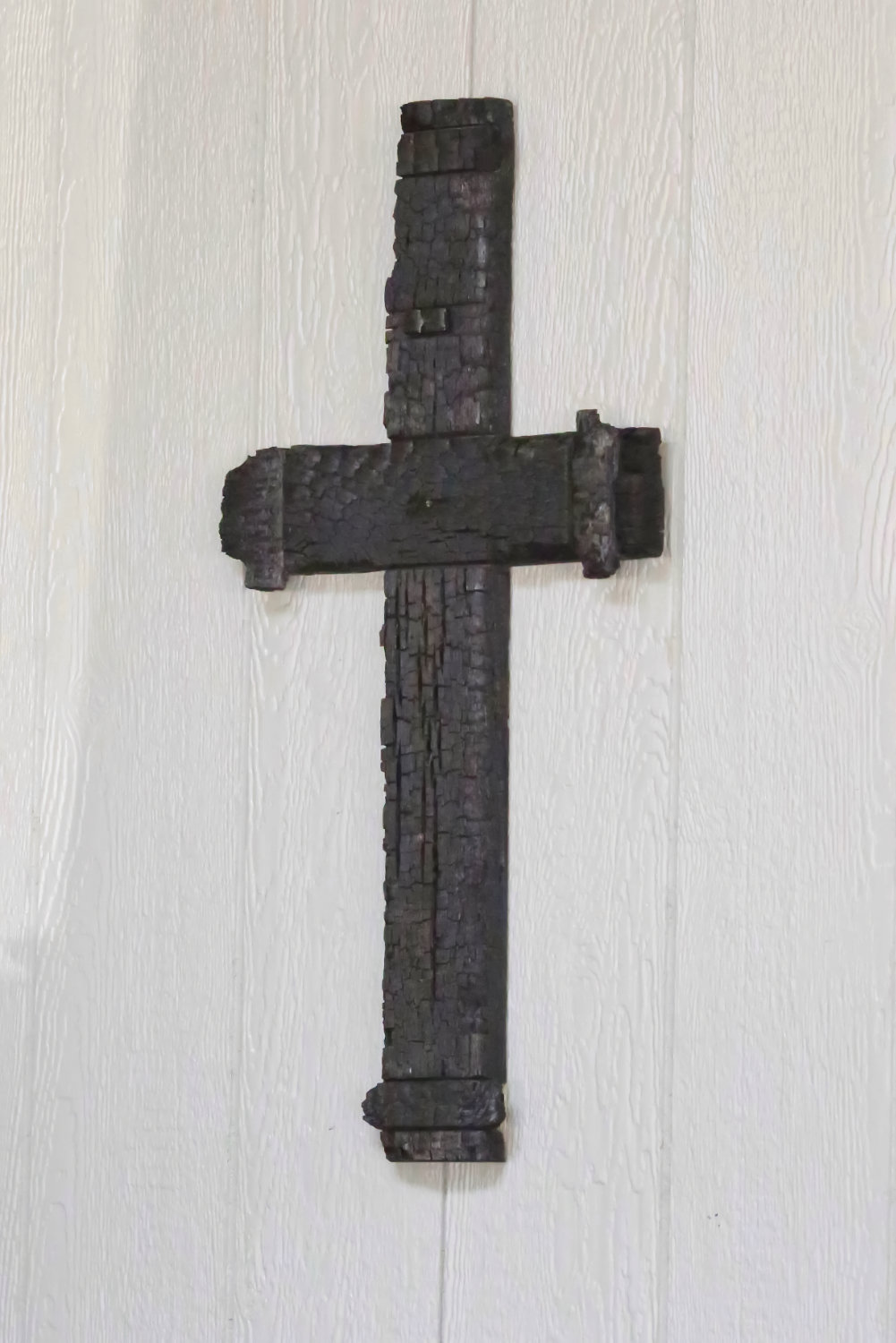 The charred cross from the original site of Richie’s already adorns the new restaurant.